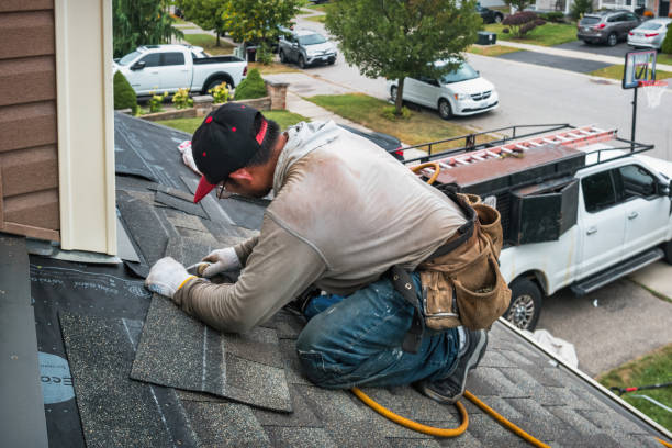 Professional Roofing technician working in Decker, IN